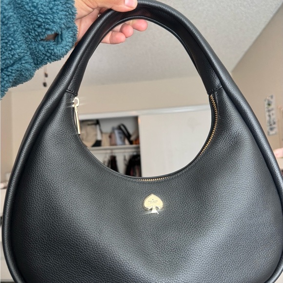 kate spade Handbags - Kate Spade Black Shoulder Bag with Gold Emblem